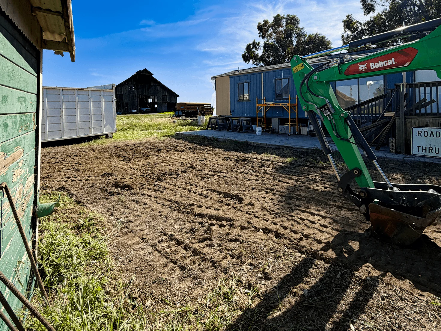 Mobile home lot cleared with an excavator