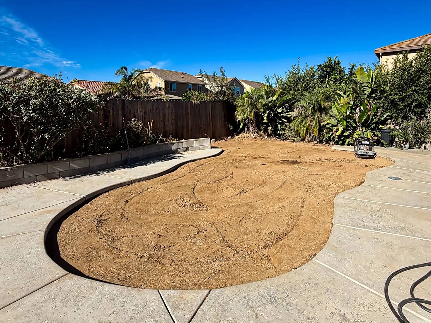 Kidney-shaped pool filled after demolition